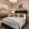Modern furnishings in apartment bedroom with high ceilings at Flats at Ponce City Market