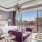 Modern furnished apartment at Flats at Ponce City Market with windows open