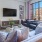Spacious studio apartment furnished living room with large windows at Flats at Ponce City Market