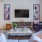 Furnished living room with ample natural lighting in homes at Flats at Ponce City Market